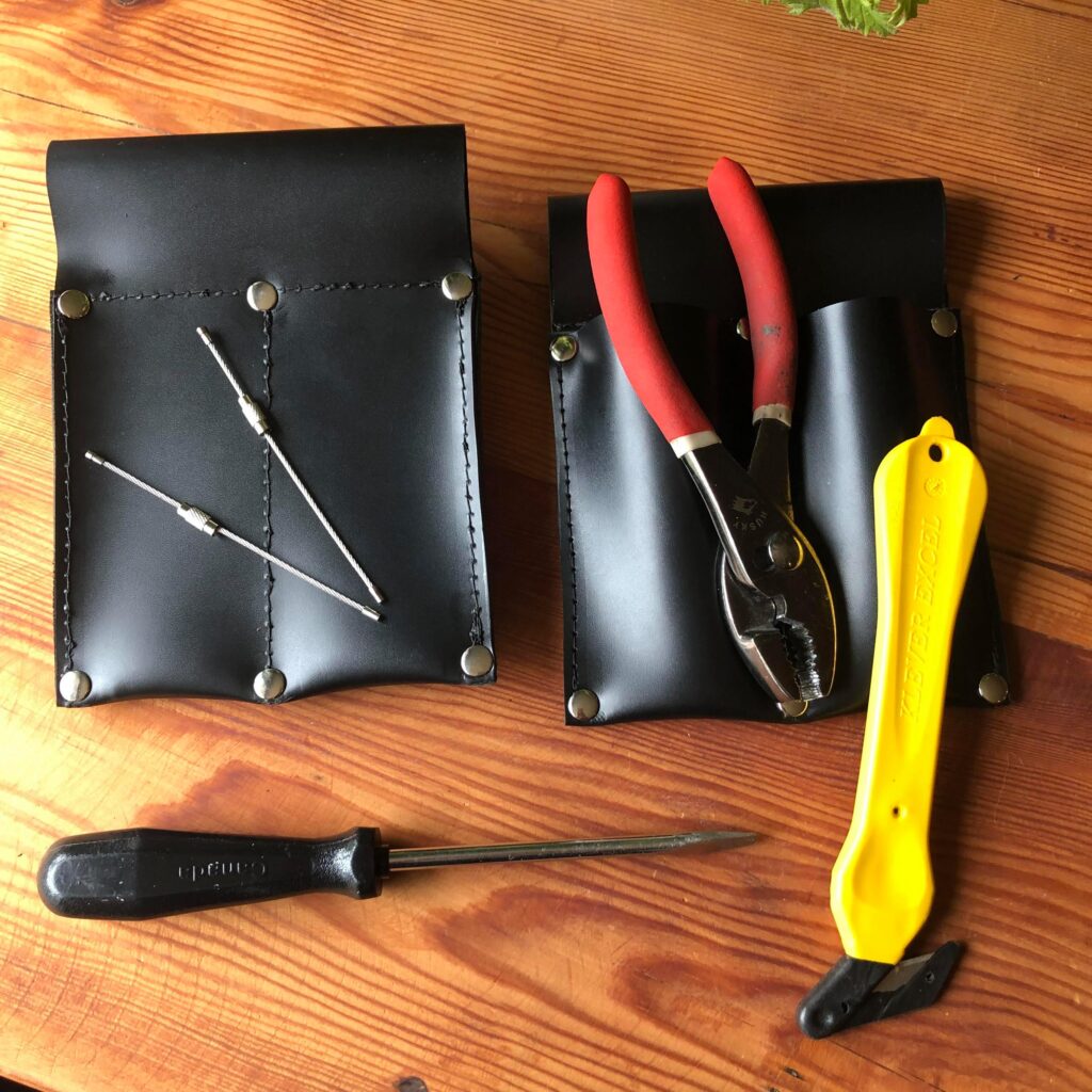 Custom made work belt pouches in black leather
