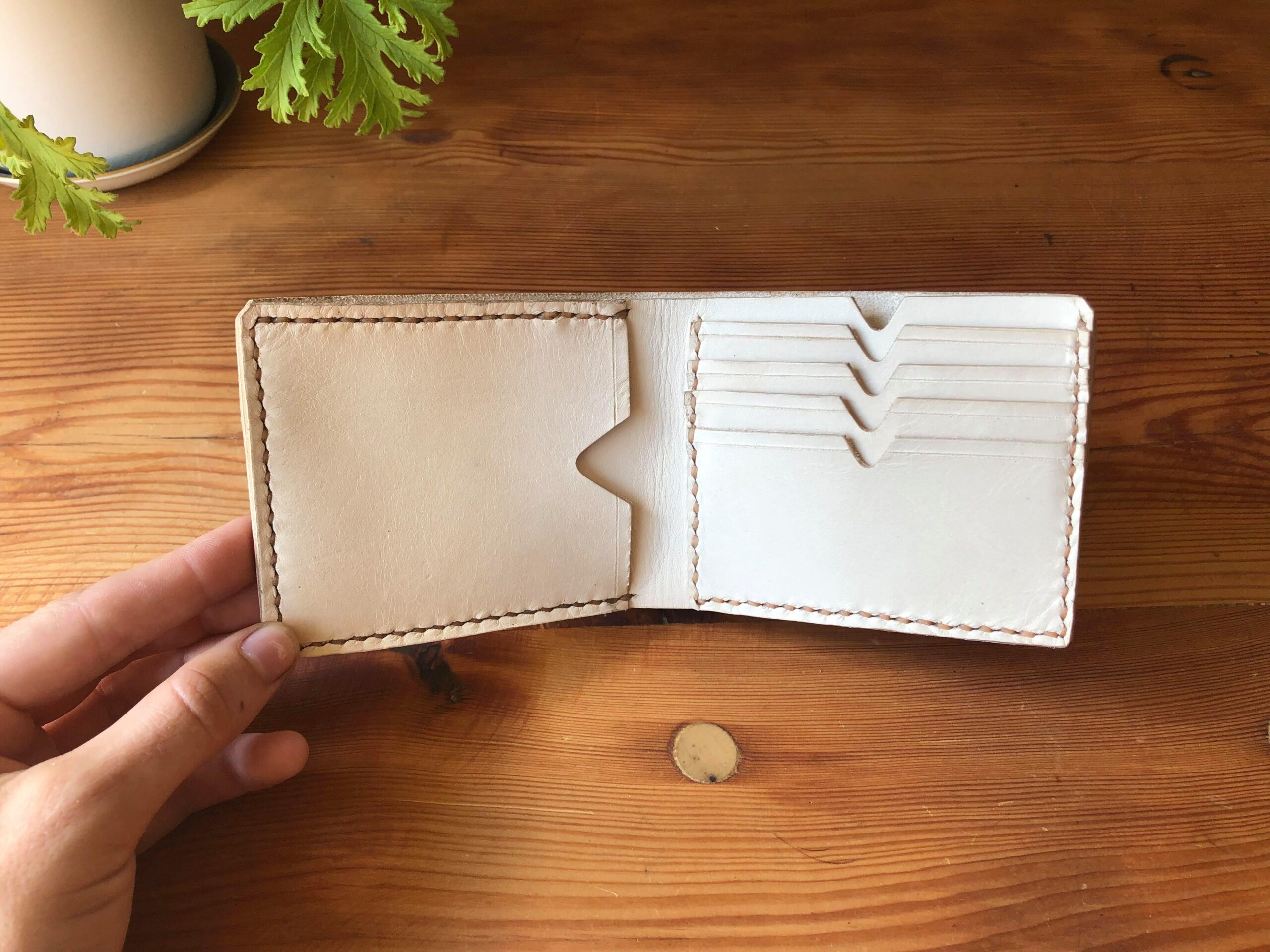 A custom made undyed vegetable tan leather wallet