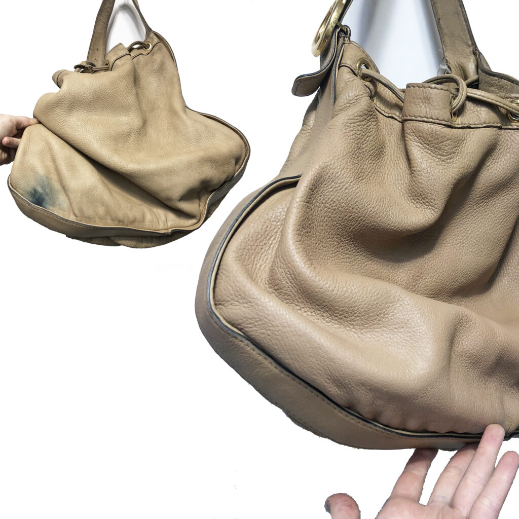 Before and after of a beige bag that had a black stain on it.