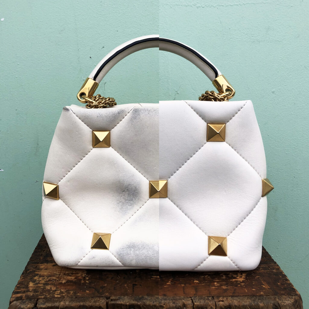 A before and after of a white purse restoration. Left side is dingy and dirty, white side is clean white. Bag is white leather with gold square studs