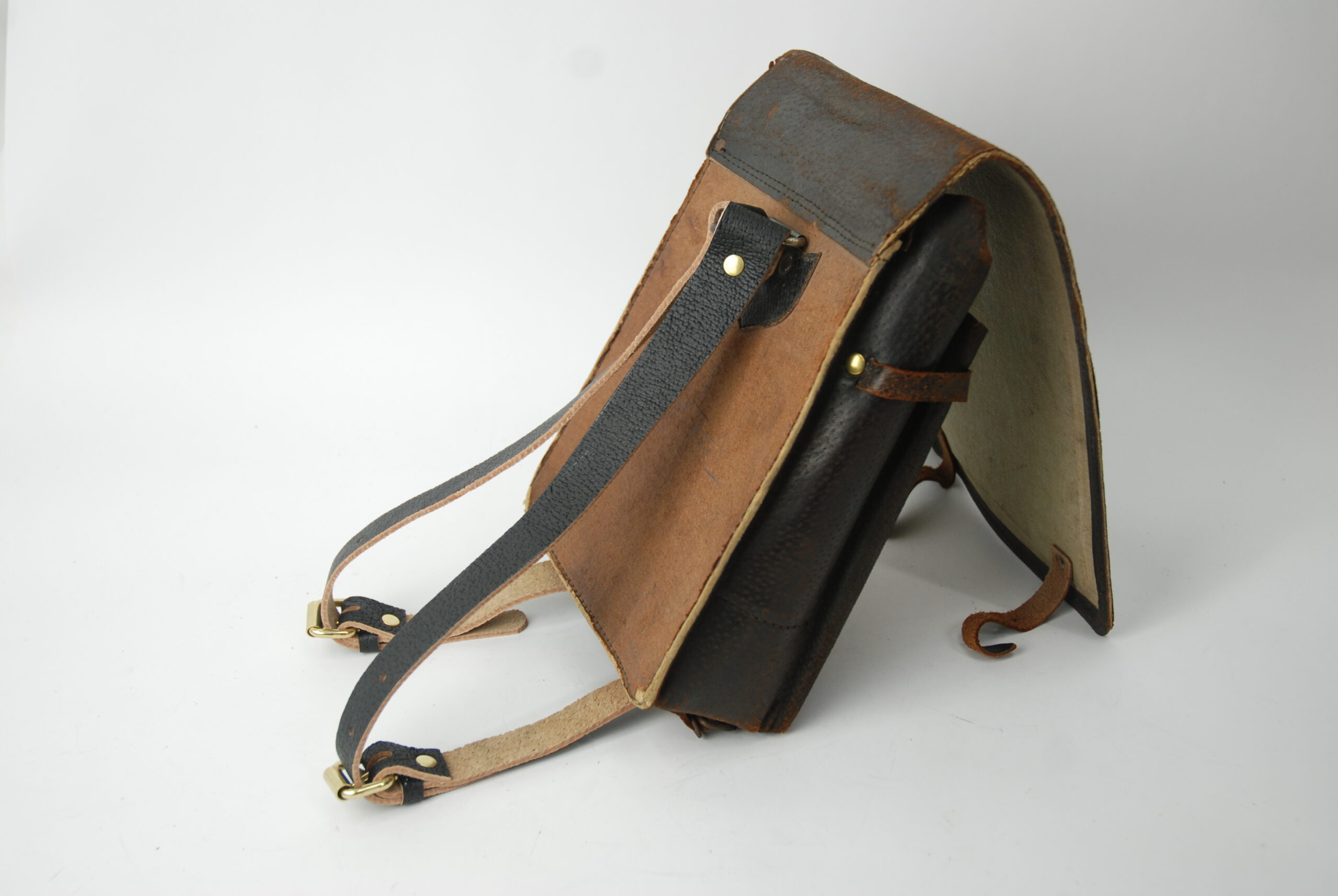 A repaired bag, with new backpack straps